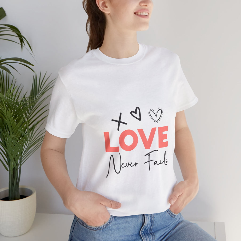 Love Never Fails T-Shirt – Inspirational Heart Graphic Tee