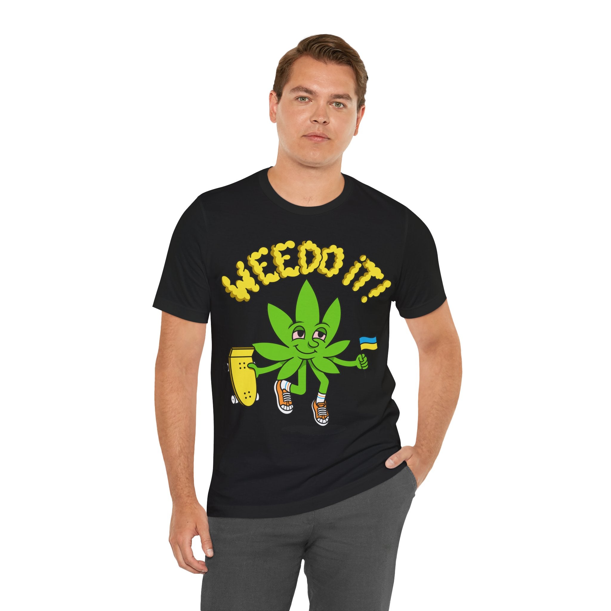 Playful Cannabis Leaf Tee — Cartoon Leaf with Flag & 'Puffs' Lettering
