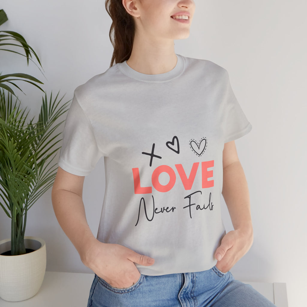 Love Never Fails T-Shirt – Inspirational Heart Graphic Tee