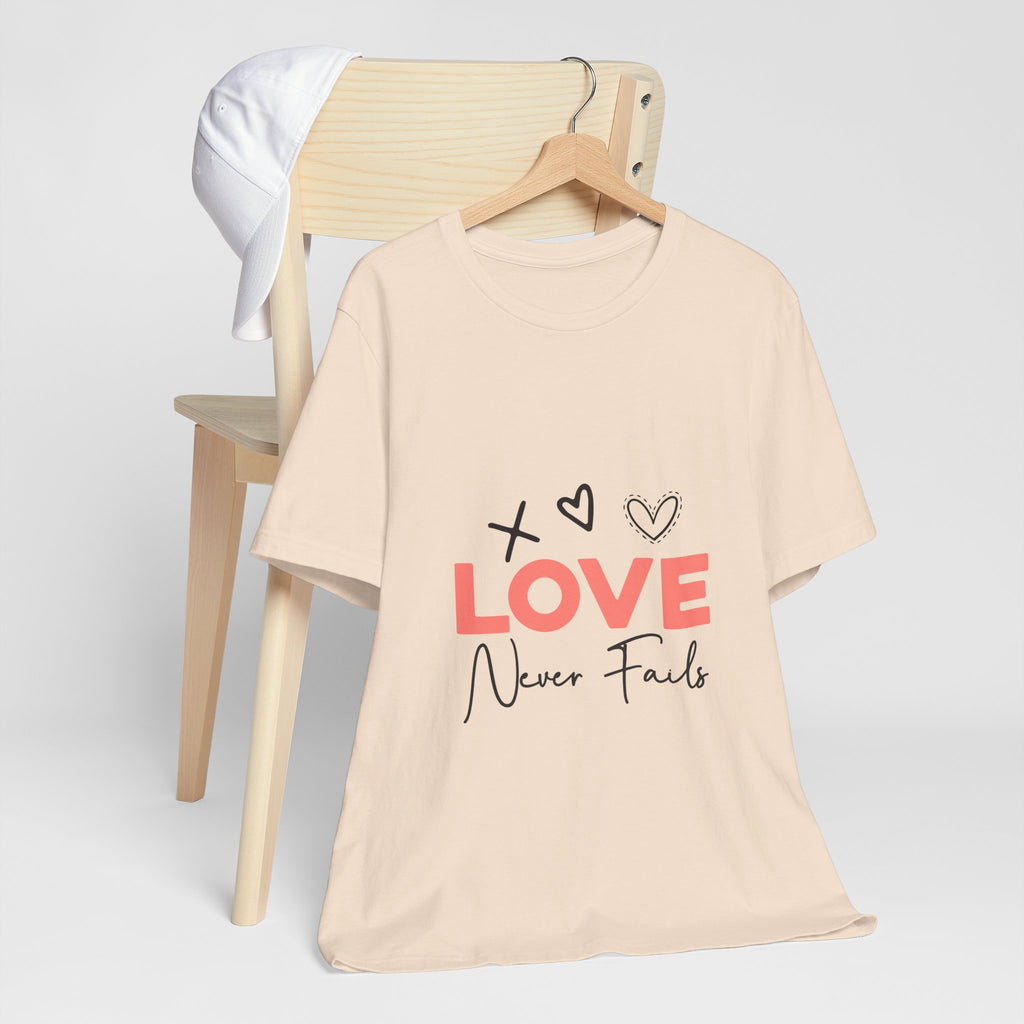 Love Never Fails T-Shirt – Inspirational Heart Graphic Tee