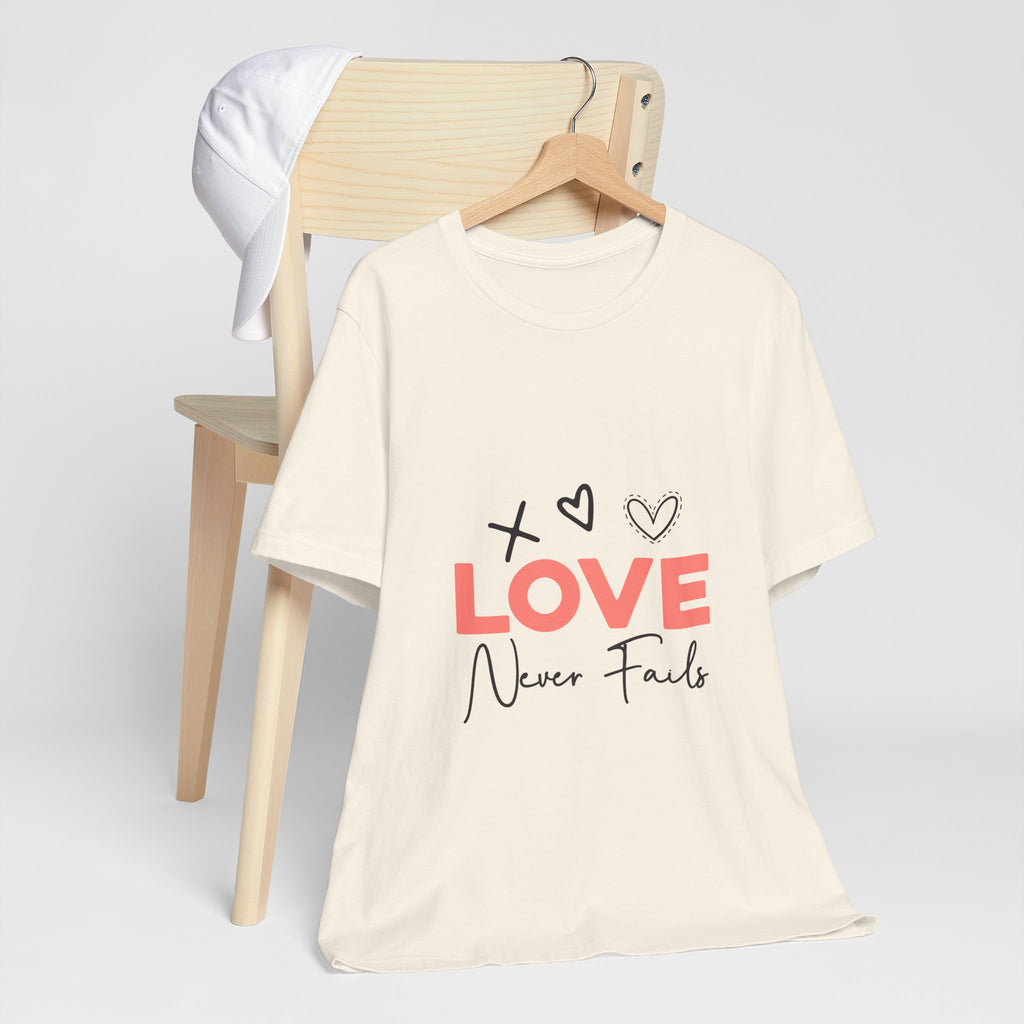 Love Never Fails T-Shirt – Inspirational Heart Graphic Tee