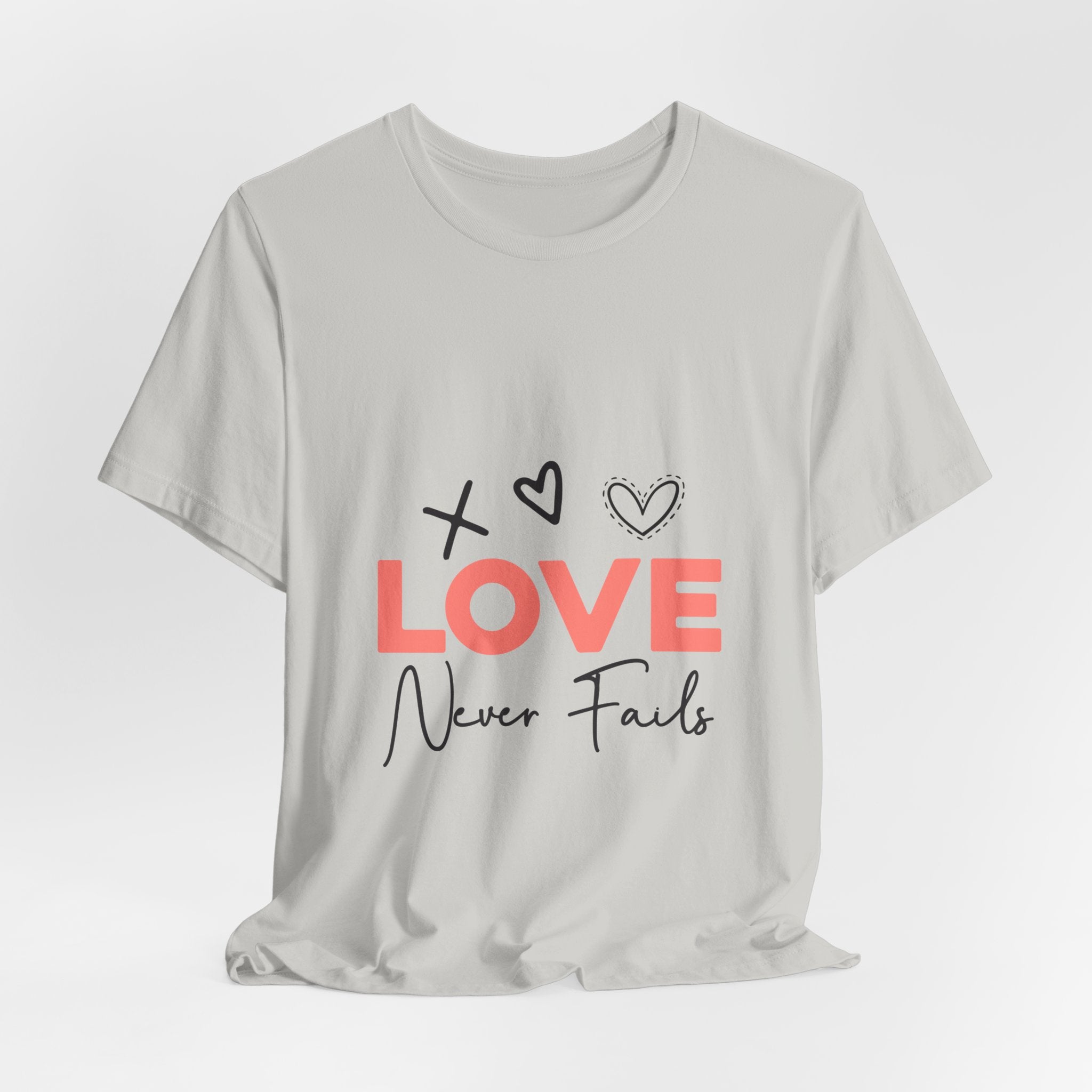 Love Never Fails T-Shirt – Inspirational Heart Graphic Tee