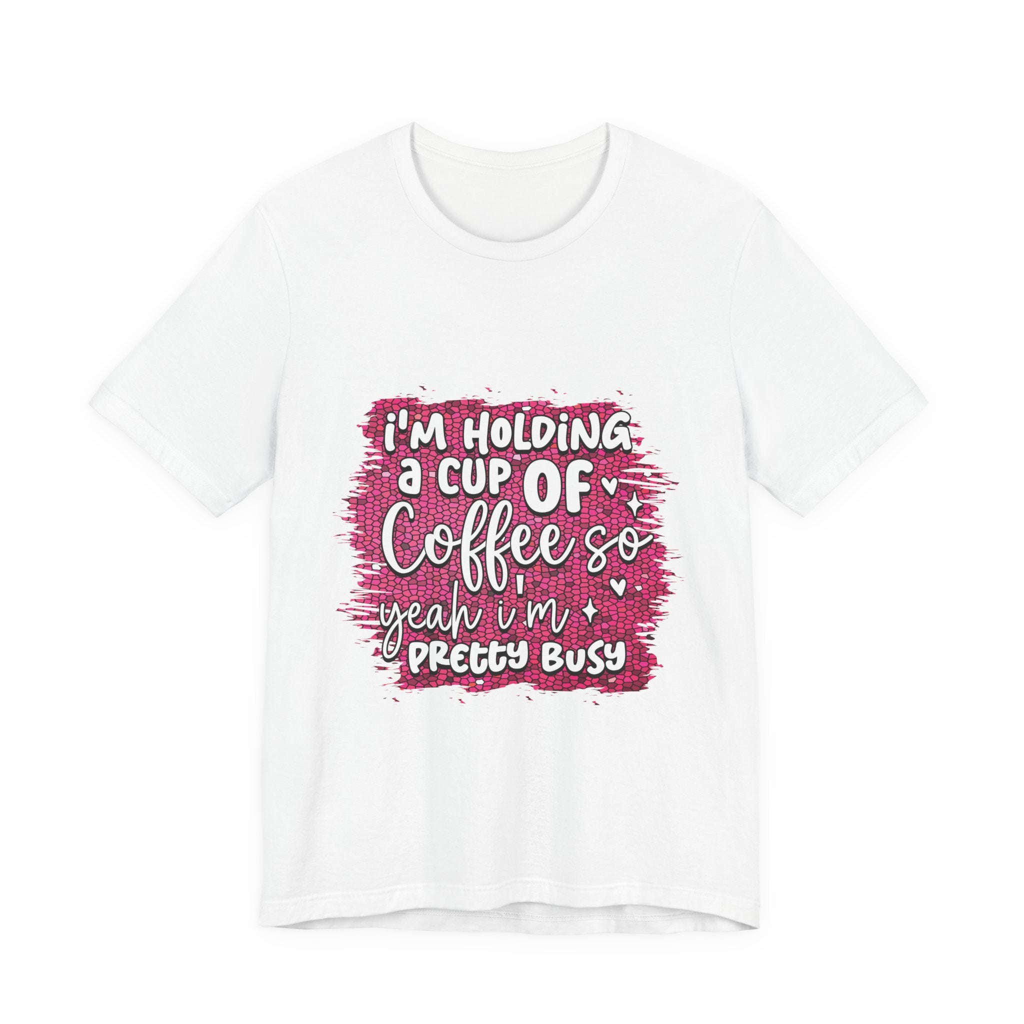 White t-shirt with pink text design on a white background