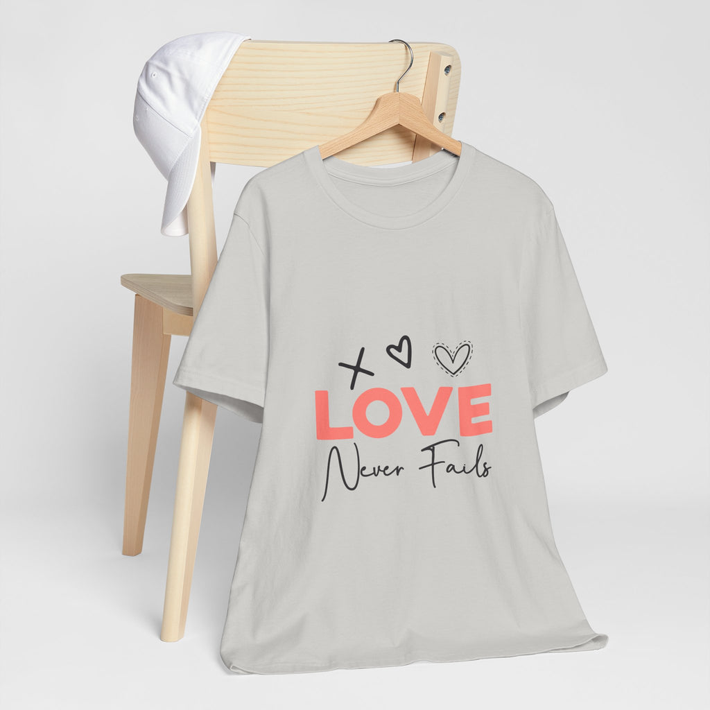 Love Never Fails T-Shirt – Inspirational Heart Graphic Tee