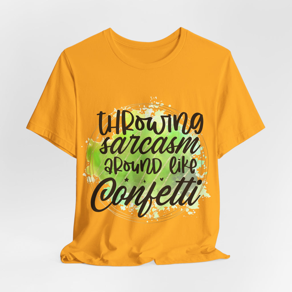 Yellow t-shirt with black text 'Throwing sarcasm around like confetti' on a light gray background